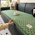 High-quality sage green corduroy sofa cushion with non-slip texture on a leather sofa - 70*70cm / Green