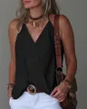 Detail shot of a black V-neck sleeveless top with loose fit and elegant wrap design. - S / Tops / Black