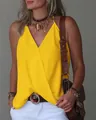 Close-up of vibrant yellow V-neck sleeveless wrap top for women in casual summer style. - S / Tops / Lemon Yellow