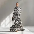 Elegant long-sleeved floral pleated maxi dress for women in chic black and white - S / Dresses / Black