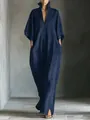 Detailed view of a navy blue V-neck maxi dress showing the loose fit and soft fabric texture - Navy Blue
