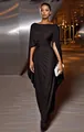Close-up detail of an elegant black evening gown featuring cape sleeves and draped design - S / Dresses / Black
