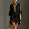 Elegant black bohemian vacation dress with golden beaded trim and high waist resort style - XS / Dresses / Black