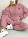 Close-up of pink cable-knit jacquard fabric on a women's casual loungewear set - S / Top And Bottom / Pink