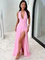 Elegant pink halter neck maxi dress with deep V-neck and high thigh slit detail. - Pink