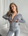 Elegante conjunto de chándal de terciopelo gris de dos piezas con chaqueta y pantalones - Gris