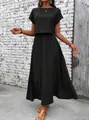 Elegant black two-piece summer outfit with a short sleeve top and a flowing maxi skirt. - S / Top And Bottom / Black