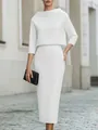Detailed view of an elegant white two-piece set with a boat neck top and midi pencil skirt - XS / Top And Bottom / White