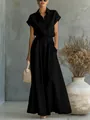 Elegantes schwarzes Kurzarmhemd und weit geschnittene Hose im Set für den Sommer-Look. - Schwarz