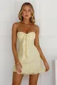 Elegant pale yellow floral textured strapless mini dress with front bow detail and ruffle hem - XS / Dresses / Yellow