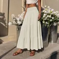 Elegant beige high-waisted smocked tiered maxi skirt for women's summer fashion wear - S / Apricot