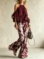 Dettaglio completo con top bordeaux allacciato al collo e pantaloni larghi stampati - XS / Top E Pantaloni / Borgogna