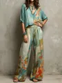 Foto de estudio de pantalones de flores de cintura alta para mujer y top coordinado - S / Parte Superior e Inferior / Azul claro