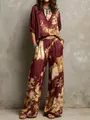 Vue complète d'un ensemble bordeaux élégant à imprimé floral pour femme avec pantalon large - Bordeaux