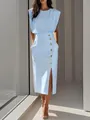 Close-up of elegant light blue sleeveless dress featuring gold buttons and side slit. - S / Dresses / Sky Blue