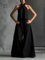 Vista completa dell'elegante completo nero composto da top senza maniche e pantaloni. - Taglia S / Top E Pantaloni / Nero