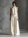 Elegante completo due pezzi bianco con top halter e pantaloni larghi a vita alta - Taglia S / Top E Pantaloni / Avorio