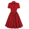 Elegante abito vintage rosso con fiocco al collo e gonna a ruota di ampiezza - Taglia S / Vestiti / Rosso
