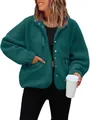 Women's teal fleece jacket featuring snap buttons and pocket details for winter. - Dark Green