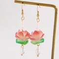 Close-up of pink gradient lotus flower earrings with white pearl drops on brass stand - Retro Lotus Style (A-767)
