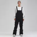 Pantaloni da sci a salopette neri professionali da donna per gli sport invernali - XS / Pantaloni e gonne / Nero