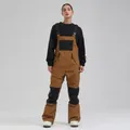 Salopette da sci professionale impermeabile e isolata da donna in tinta marrone e nero - XS / Pantaloni e gonne / Caffè Scuro E Nero