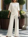 Elegante completo due pezzi bianco con top drappeggiato e pantaloni a gamba larga. - Bianco latte