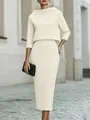 Vista detallada de un elegante conjunto de dos piezas crema con falda de tubo y blusa chic - XS / Top Y Pantalón / Albaricoque