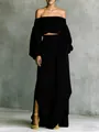 Elegante completo nero con crop top a spalle scoperte e gonna lunga asimmetrica - Nero