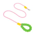Vibrant pink dog leash featuring a comfortable green bubble foam handle for easy grip - Pink