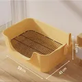 Large yellow bathtub-style dog litter box with metal grate and scoop, 59x43x23cm size - Large Bathtub Dog Toilet / With Cleaning Scoop / Yellow