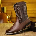 Detail of brown western cowboy boot with intricate white embroidery and V-cut shaft top - 39 / Brown