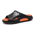 Modische schwarz-orange Sommer-Slipper für Damen und Herren mit einer Komfortsohle - 44-45 / Pantoletten / Schwarz Orange