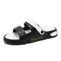 Schwarz-weiße Sport-Sandalen mit rutschfester Sohle und drehbarem Fersenriemen - 44-45 / Schwarz Weiß