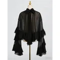 Elegante schwarze Mesh-Langarmbluse mit gestuften Rüschenärmeln und Rückenschleife - Schwarz