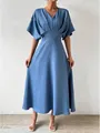 Elegant blue V-neck midi dress featuring a high waist and textured short sleeves design - S / Dresses / Sapphire Blue
