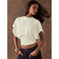 Retro polka dot French cropped top with batwing sleeves and cinched waist in white - S / Tops / Apricot