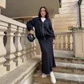 Stylish women's black denim two-piece set featuring a zip-up jacket and long skirt - XS / Top And Bottom / Black