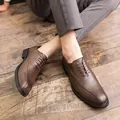 Classic brown leather men's Oxford shoes with business casual brogue detailing - 38 / Brown