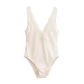 Elegant white silk satin bodysuit featuring delicate floral lace embroidery at the V-neckline - XS / Jumpsuits / White