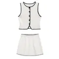 Elegant white two-piece knit set featuring black contrast scalloped trim and mini skirt - S / Top And Bottom / Off White