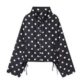 Detailed view of women's black and white polka dot jacket with drawstring collar. - XS / Tops / Black