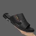 Close-up side view of men's black breathable outdoor beach sandal with fashion tag. - 39 / M621 Style (M621) / Black