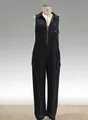 Sleeveless black wide-leg jumpsuit with contrast stitching and zipper detail on a mannequin - S / Jumpsuits / Black