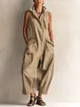 Dettaglio della tuta utilitaria senza maniche vintage da donna con tasche multiple - Taglia S / Tute intere / Kaki