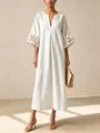 Detailed view of a white cotton linen dress featuring elegant 3D floral sleeves - White