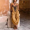 Vista dettagliata della stampa etnica boho su una tuta senza maniche giallo senape - Giallo