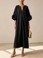 Close-up of black cotton-linen midi dress featuring 3D flower appliqué sleeves - Black