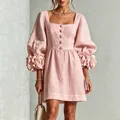 Charmante roze Franse linnen jurk met 3D bloemaccenten en elegante lantaarnmouwen - S / Dresses / Roze