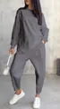 Modern grey women's two-piece loungewear set featuring an irregular hem sweatshirt and pants - S / Top And Bottom / Gray